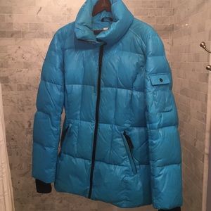 Bright blue down puffer jacket